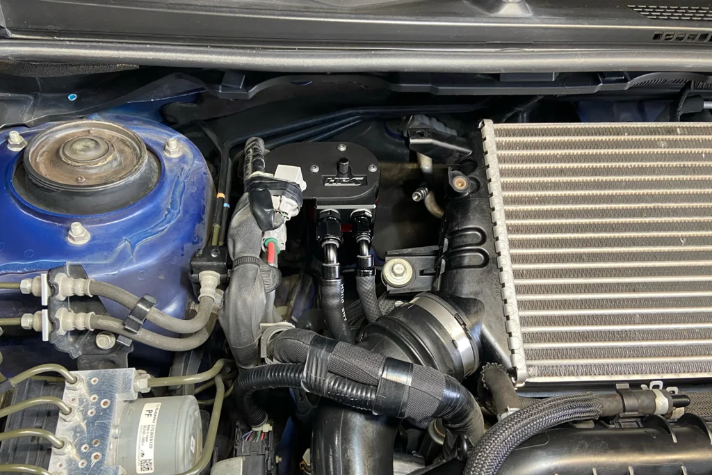 A Vehicle-Specific Oil-Catch Can on a Turbocharged Engine