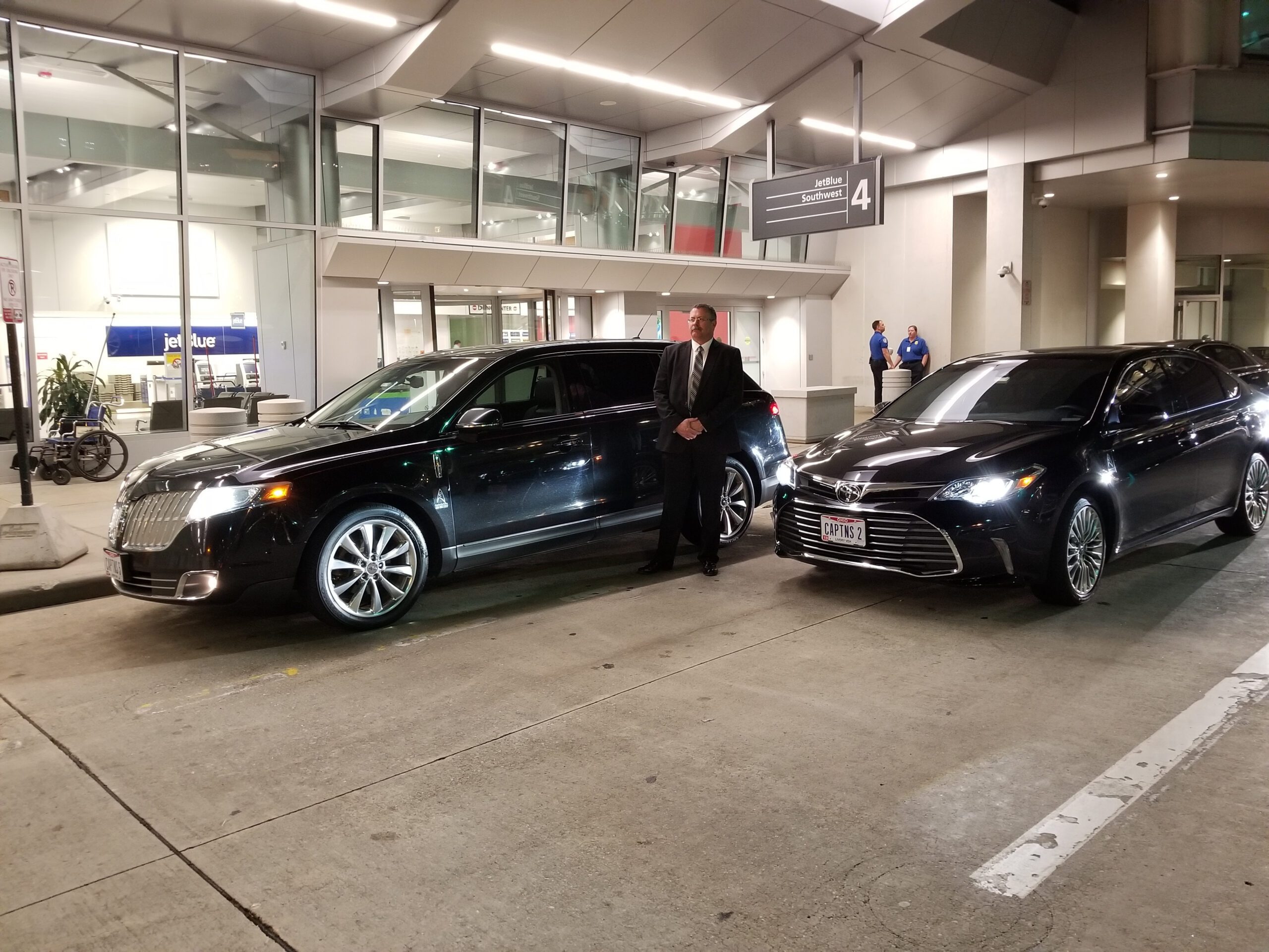 Black Lincoln MKX and a black Toyota Camry