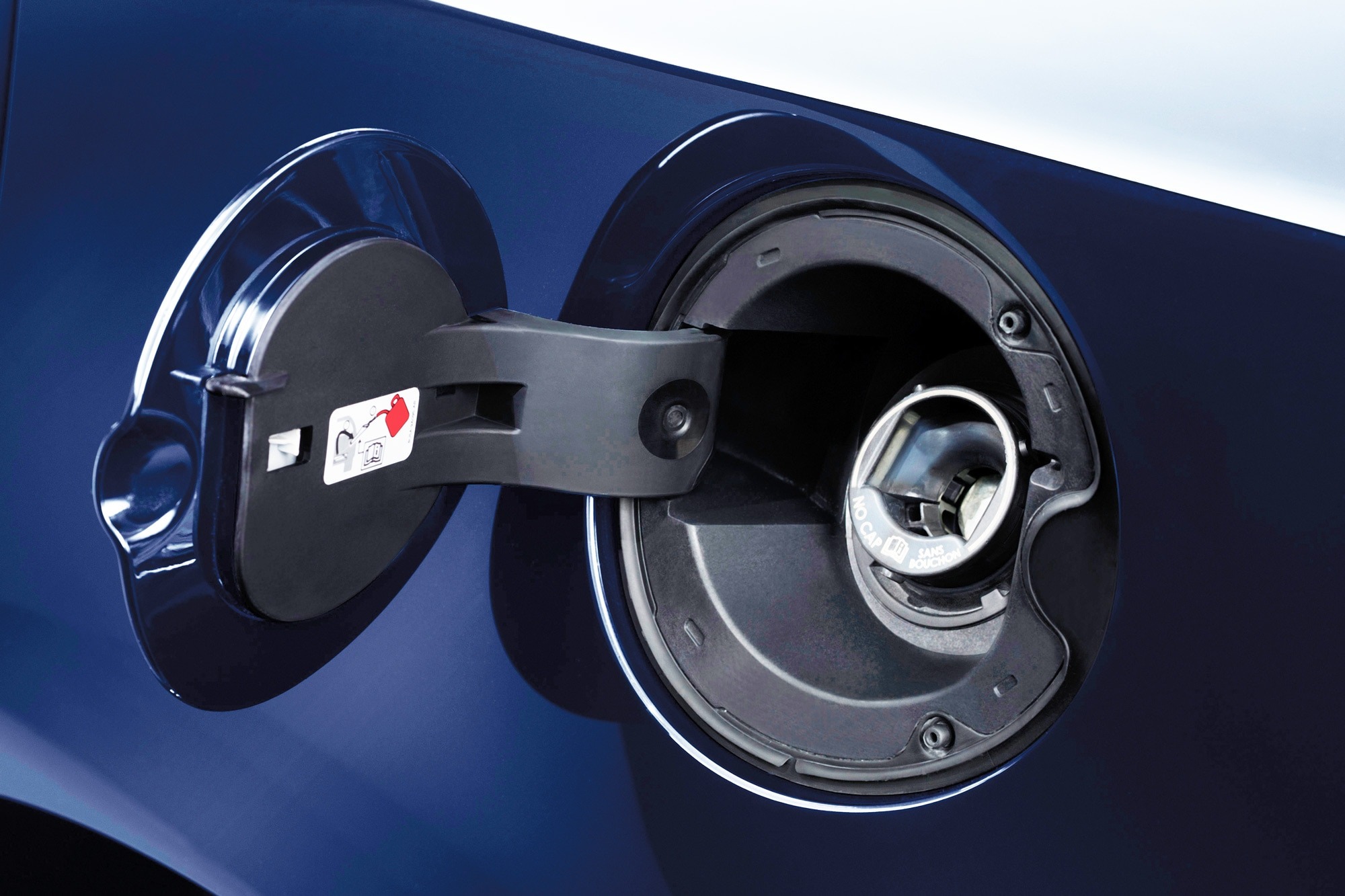 Capless fuel filler