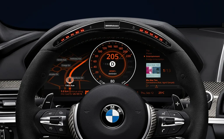 A BMW Dashboard is shown with different indicators and lightings