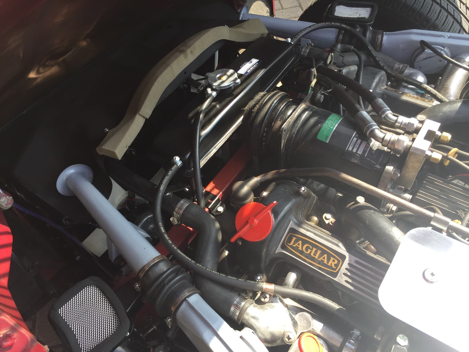 Engine bay of a Jaguar E-Type Series III V12 Roadster