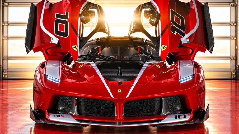Ferrari FXX-K red hypercar with raised butterfly doors number 10