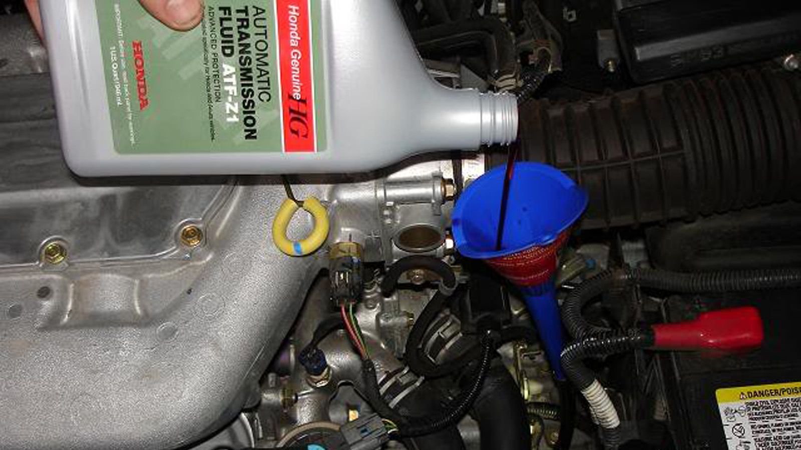 Honda Accord undergoing a transmission fluid change