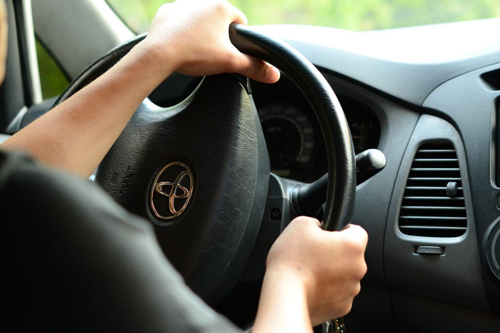 Regularly turning the wheel while stationary