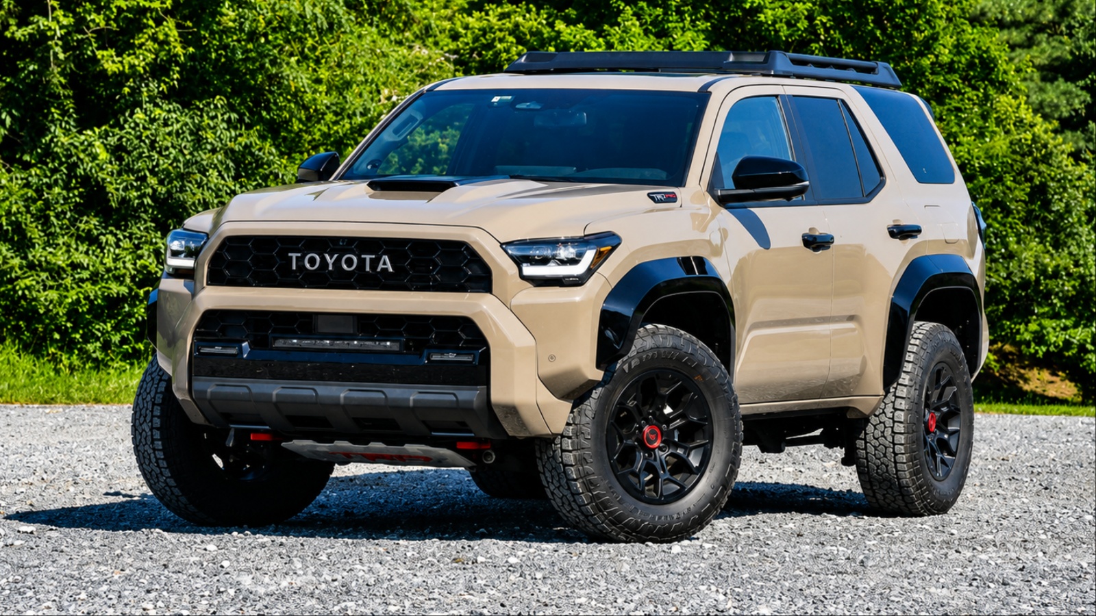 Tan Toyota 4Runner TRD Pro off-road SUV parked on gravel