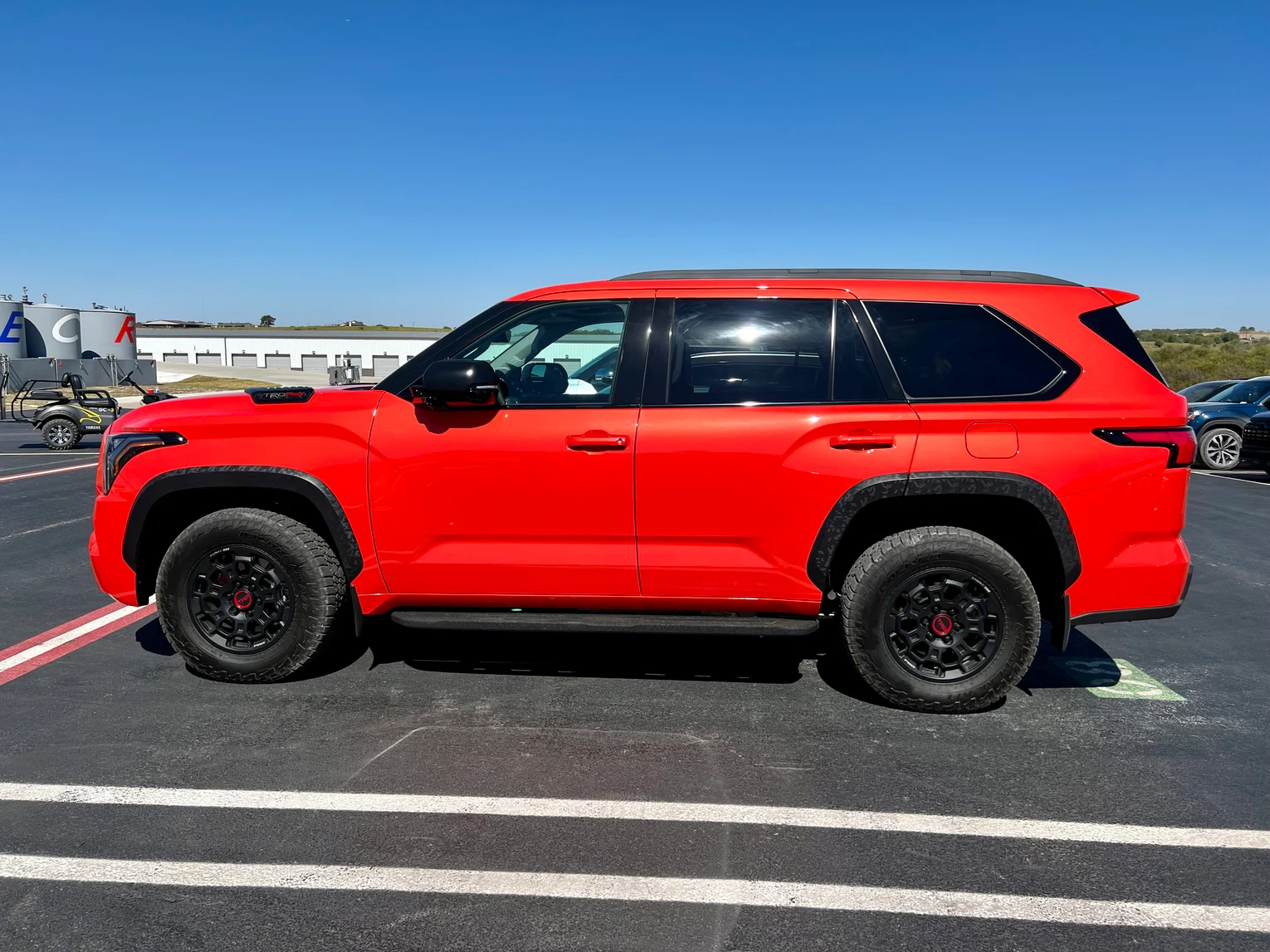 A Toyota Sequoia is standing in a parking lot