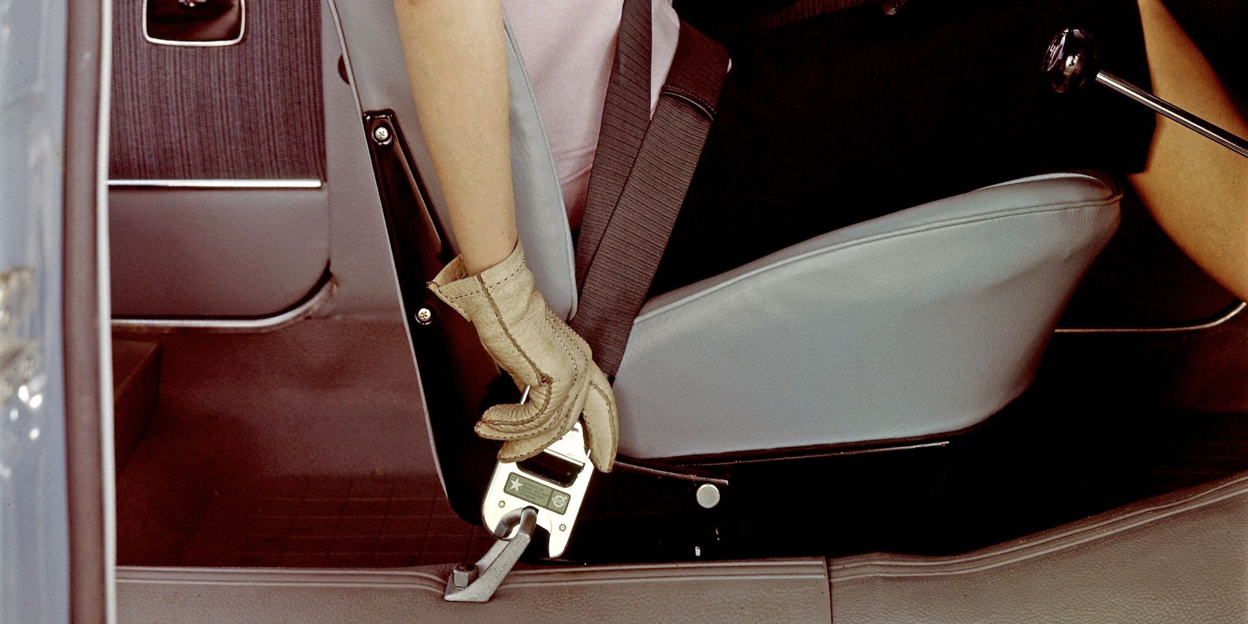 Volvo three-point seatbelt in a vintage car interior