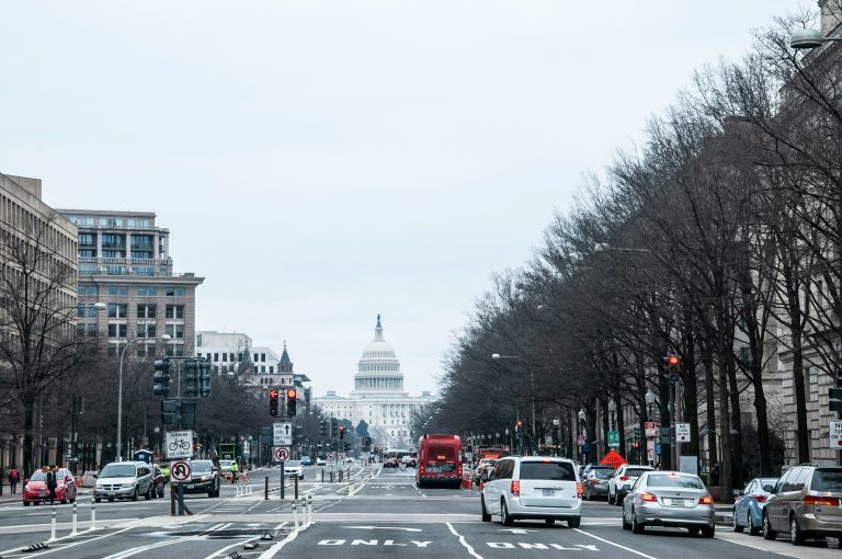 A Washington main street is shown filled with the car