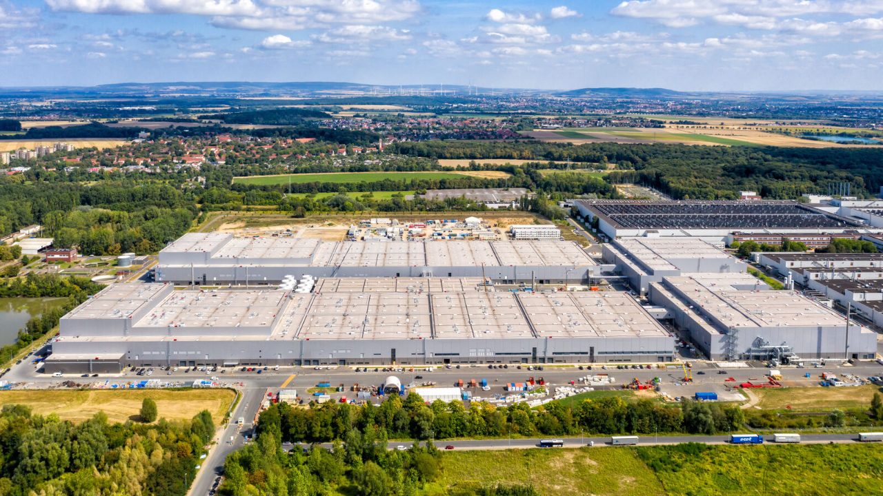 Aerial view of Volkswagen’s large industrial facility surrounded by fields, roads, and countryside
