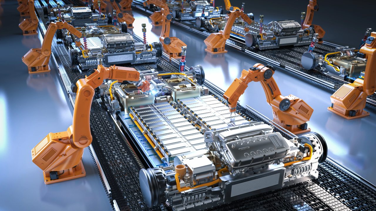 Automated factory robots assemble electric vehicle battery packs on production lines