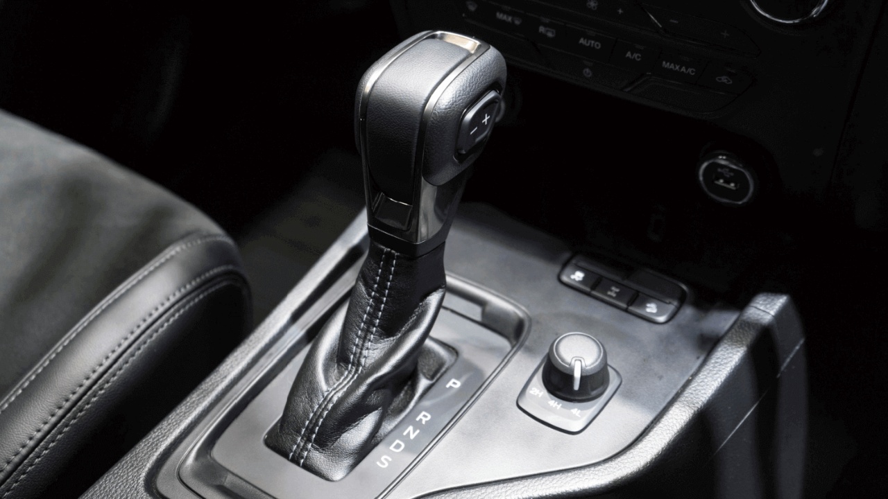 Automatic transmission gear selector showing Park, Reverse, Neutral, Drive, and Sport modes