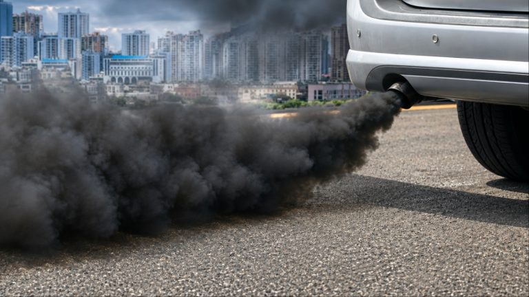 Black diesel exhaust cloud billowing