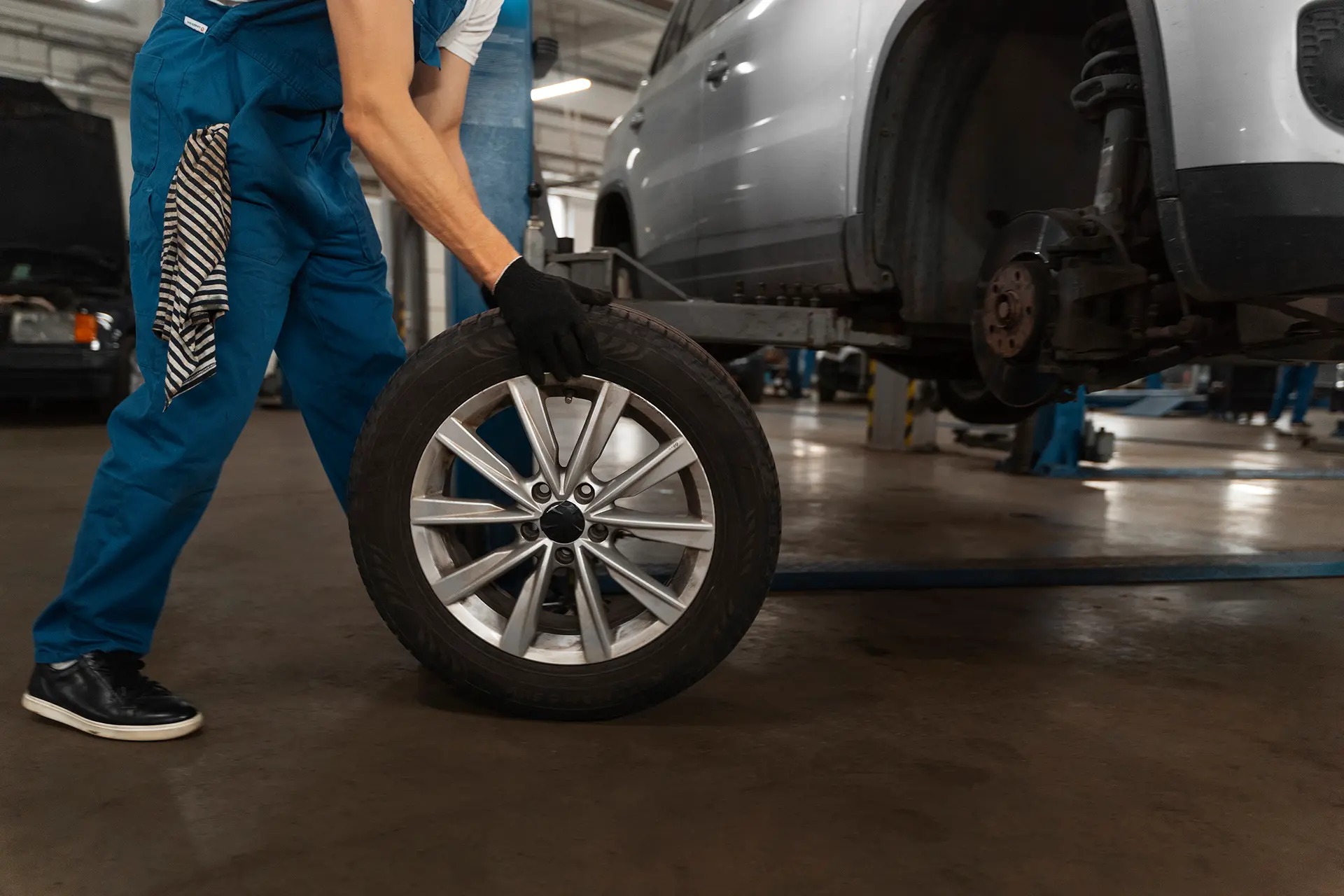 Car tire in a professional auto repair shop