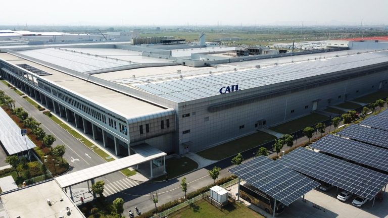 CATL battery manufacturing facility, shown from above with extensive solar-panel installations across the site