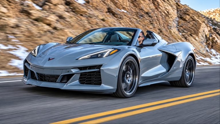 Chevrolet Corvette E-Ray driving through a winding mountain road