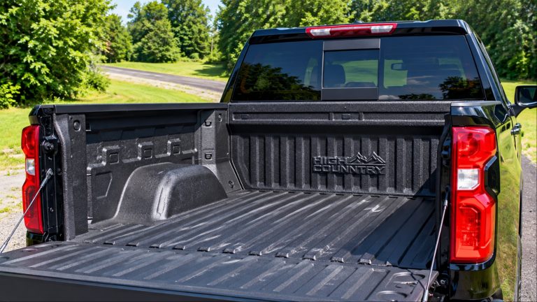 Chevrolet Silverado High Country pickup bed with tailgate lowered, showing rugged bed liner