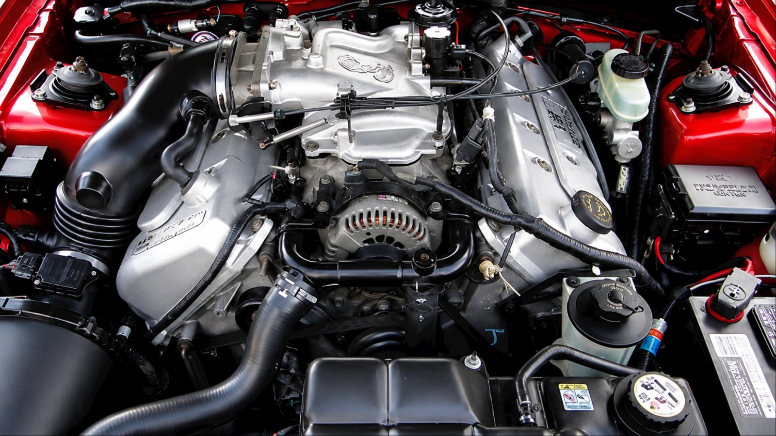 A ford engine is shown which looks pristine