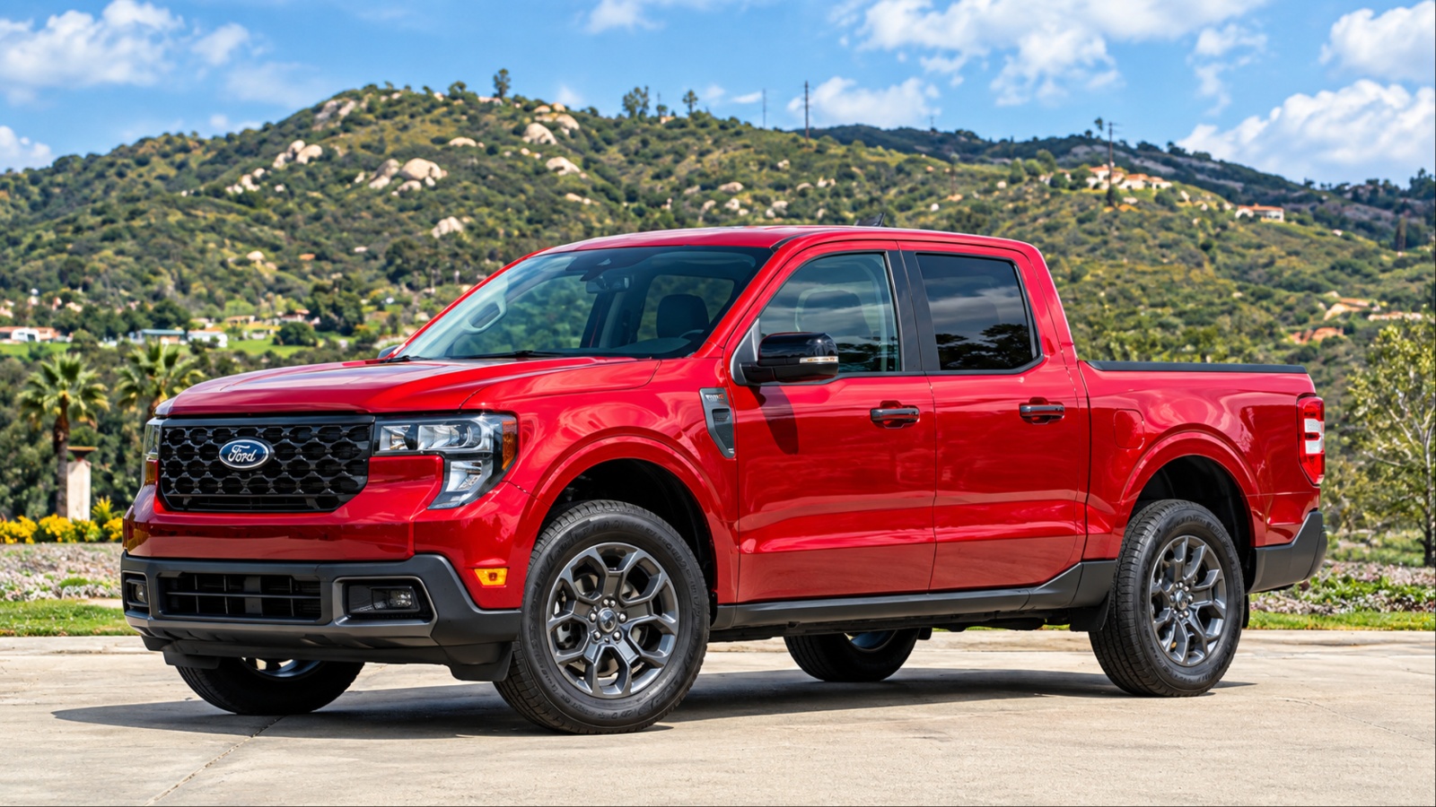 Ford Maverick Hybrid pickup parked against a scenic mountainous landscape