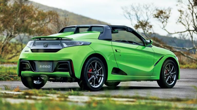 Honda S660 sports car showcasing its compact design, rear wing, and open-top styling