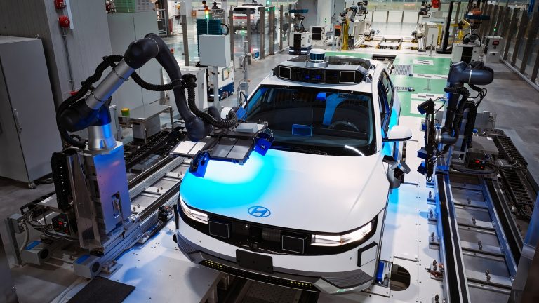 Hyundai Ioniq 5 undergoing automated assembly in a modern factory