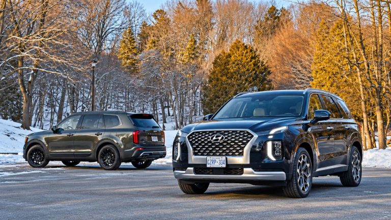 Hyundai Palisade and Kia Telluride face off in a snowy parking area