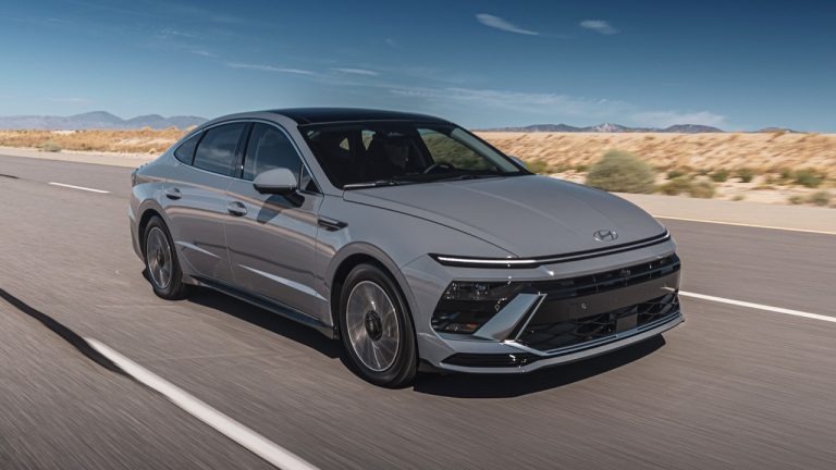 Hyundai Sonata Hybrid cruises through the desert, blending efficiency with sleek styling