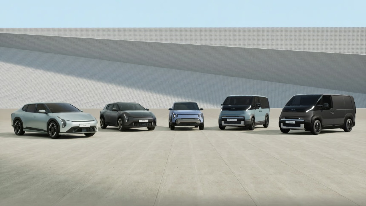 Kia EV lineup displayed together in a spacious, modern outdoor setting