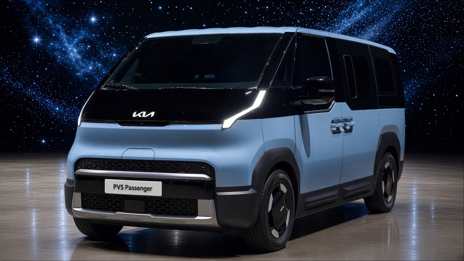 Kia PV5 electric passenger van displayed on a dark stage