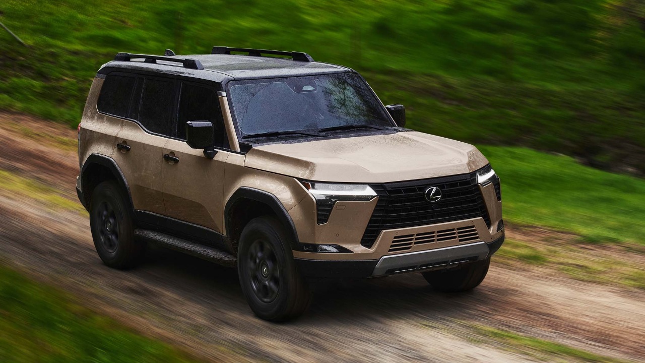 Lexus GX driving off-road, showcasing its rugged design and adventure-ready stance