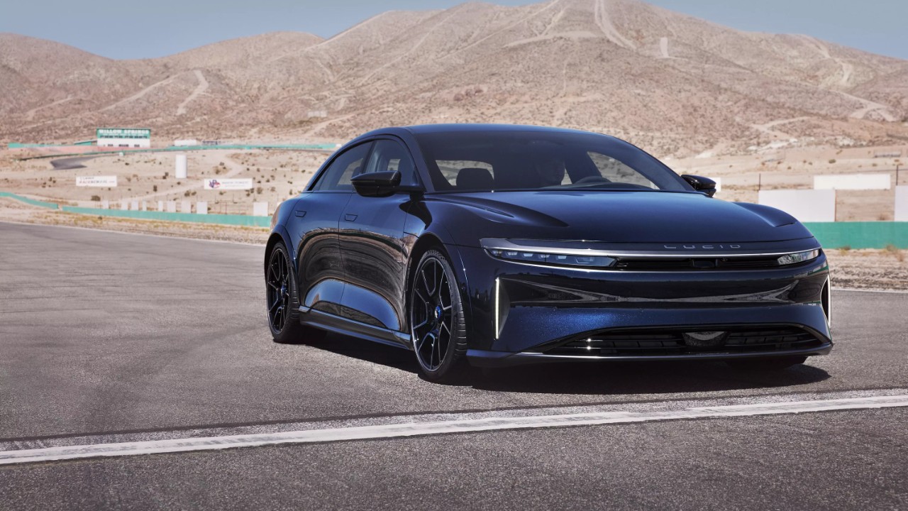 Lucid Air Sapphire on a racetrack with a desert mountain backdrop
