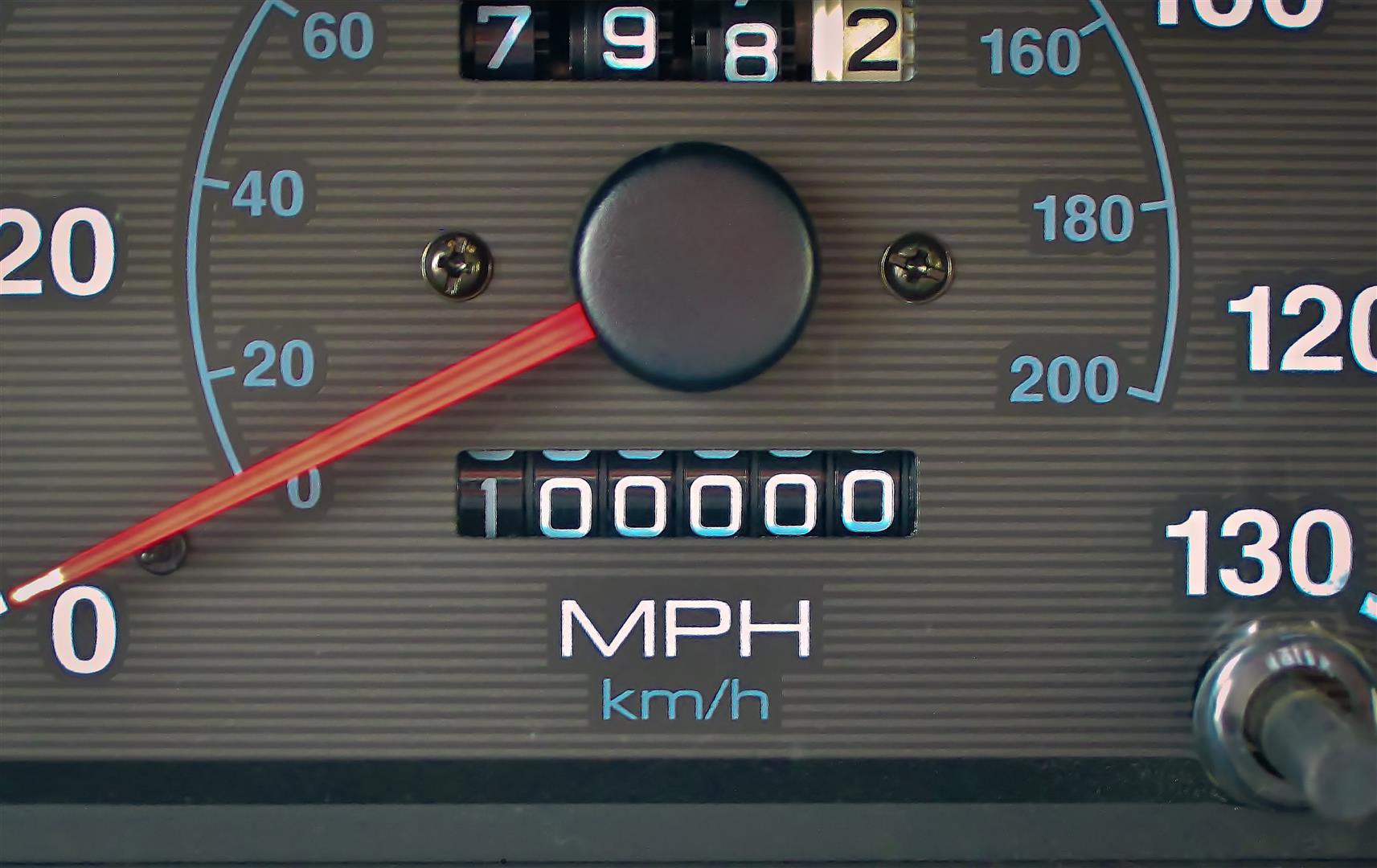 Odometer reading of 100,000 miles