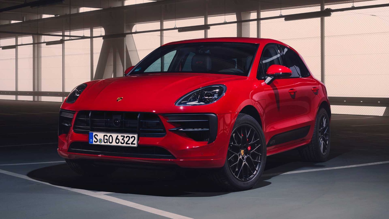 Porsche Macan GTS in striking red, showcasing its sporty luxury SUV design