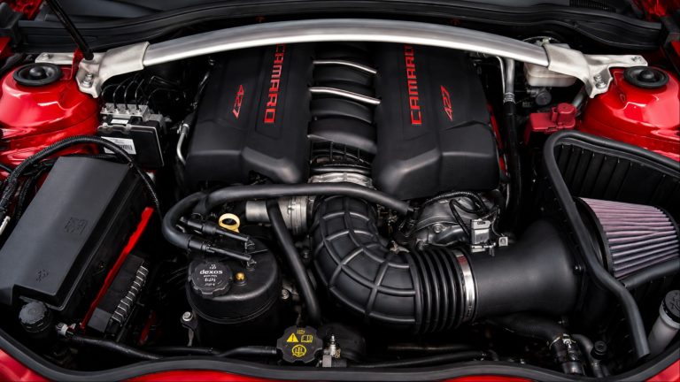 Red Chevrolet Camaro 427 V8 engine bay with cold-air intake