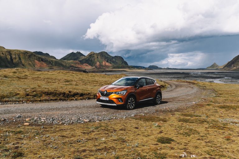Renault Captur driving along a gravel road