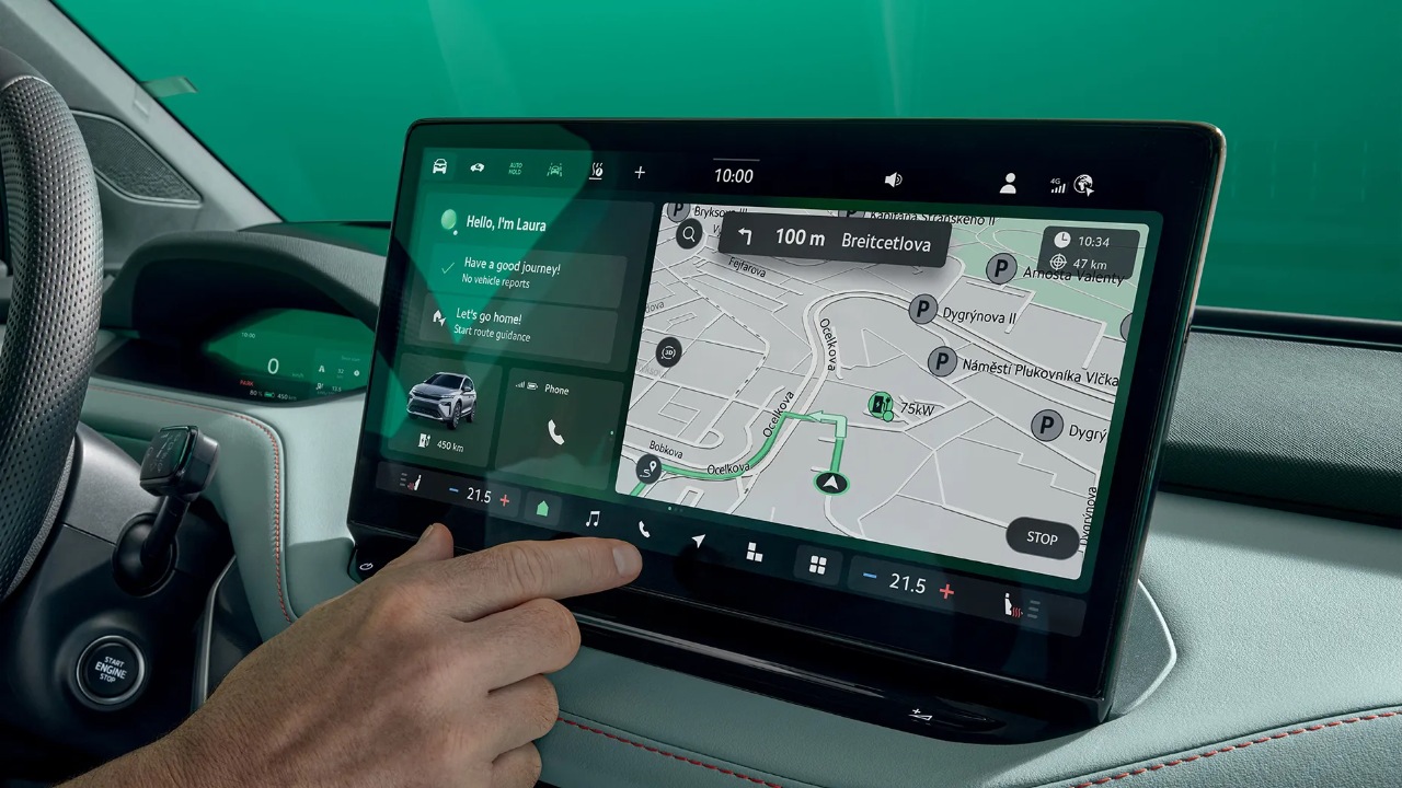 Škoda Elroq interior featuring a large touchscreen with navigation and connected vehicle controls