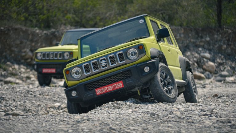 Suzuki Jimny tackling rugged terrain during an off-road adventure