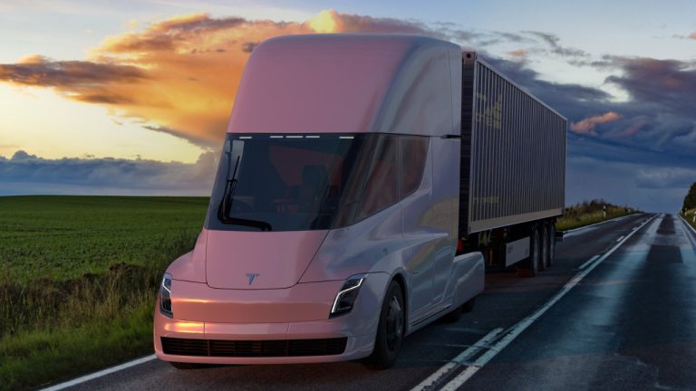 Tesla Semi electric truck hauling a trailer along a scenic rural highway