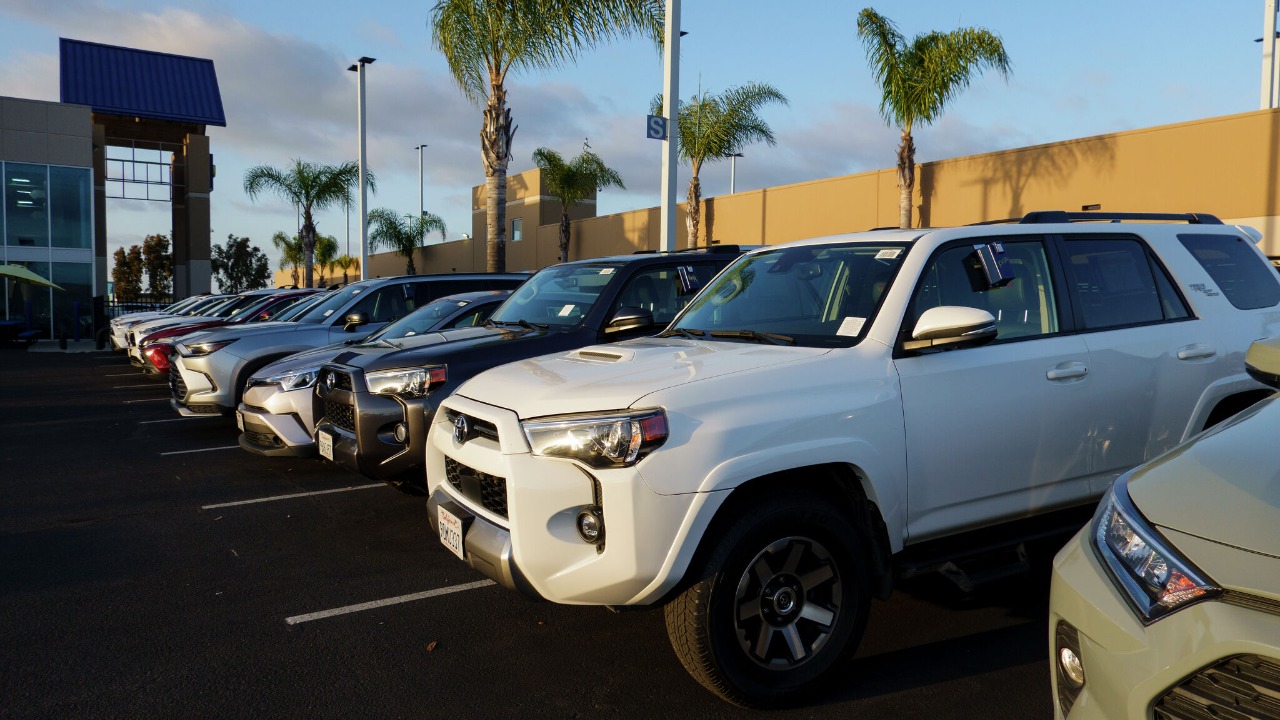 Toyota 4Runner leads a row of SUVs at a dealership