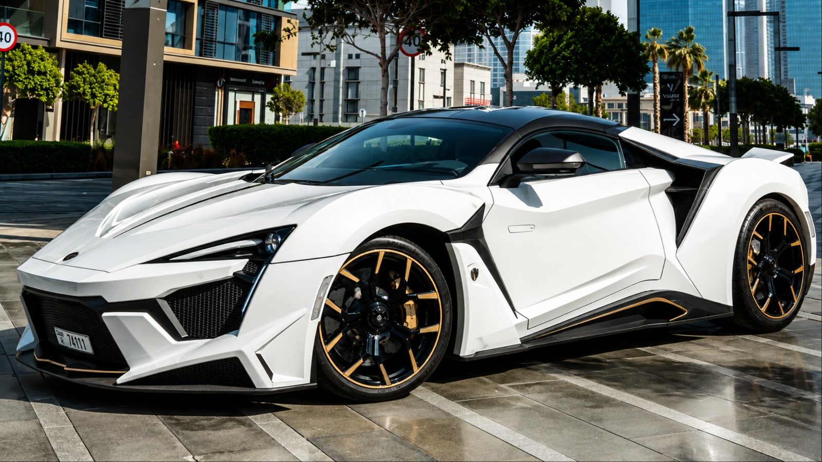 White W Motors Fenyr Supersport hypercar parked on city street