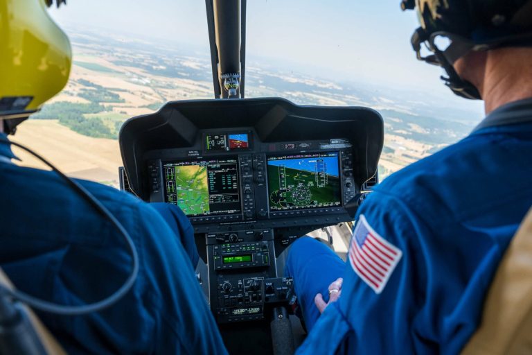 2 drivers are navigating a helicopter