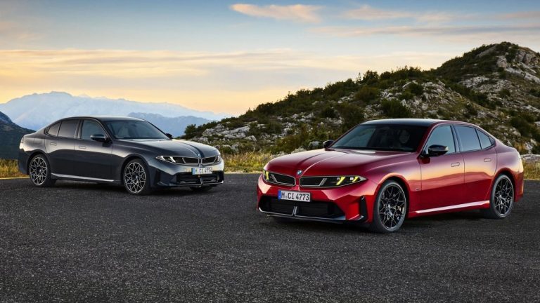 2027 BMW M350 xDrive sedan parked on a mountain road with rugged peaks in the background