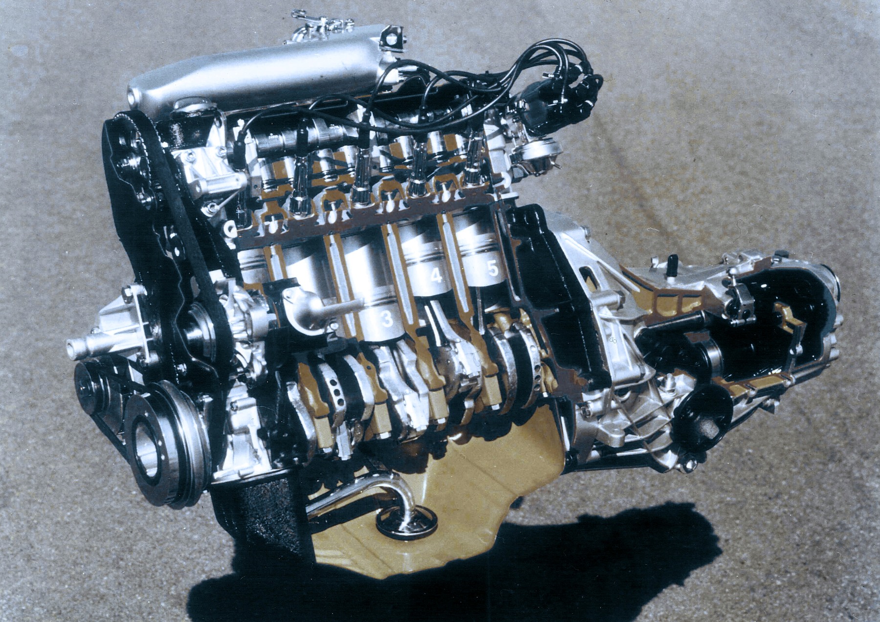 An engine is shown with it's silver paint and clean aesthetics
