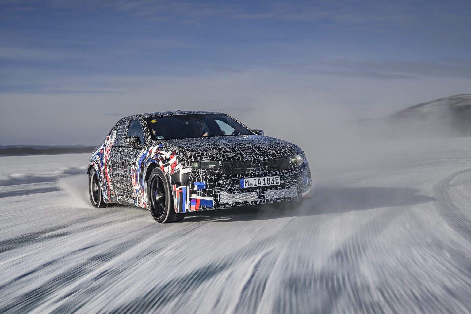 BMW electric M3 prototype undergoes high-speed winter testing across a snowy test track