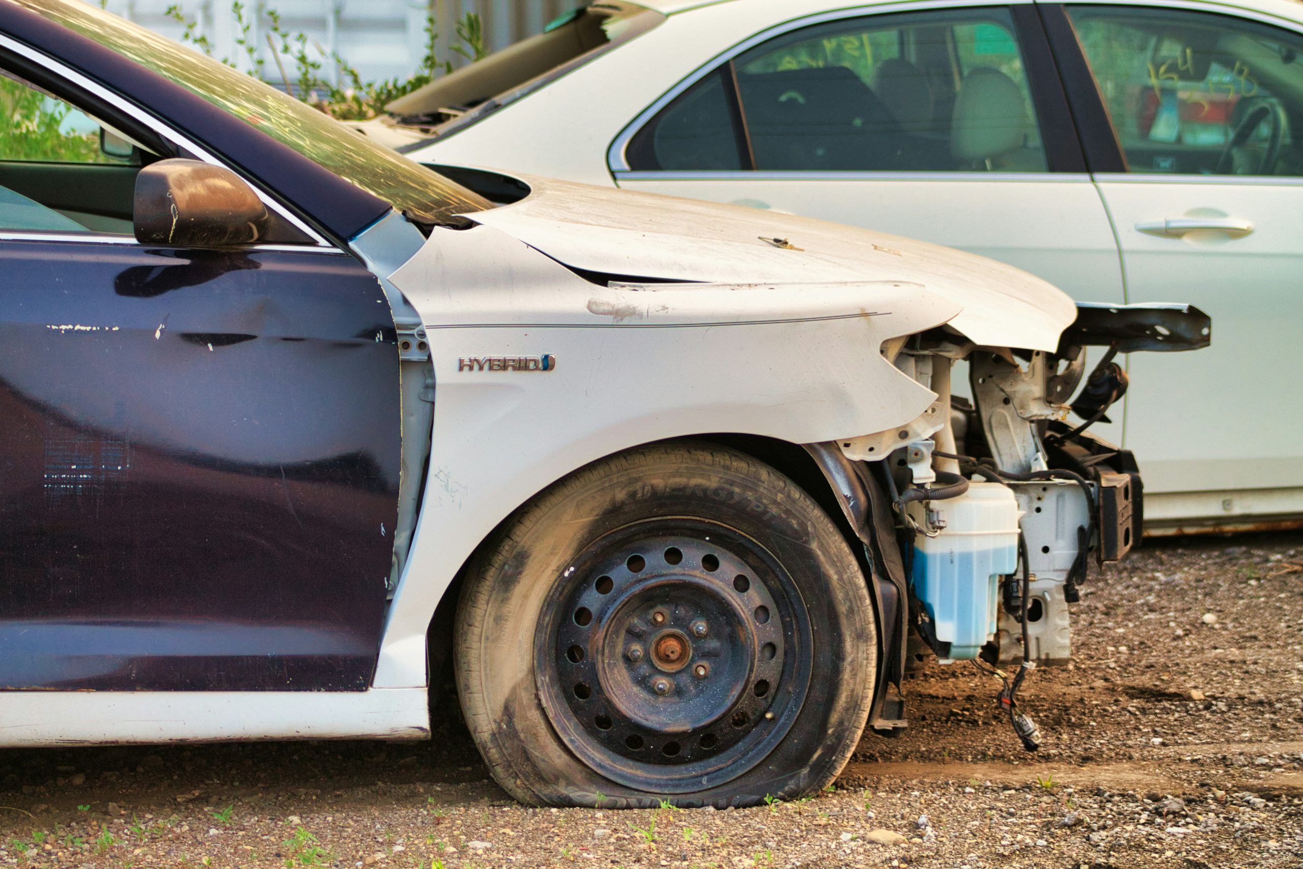Front portion of car is damaged due to a collision