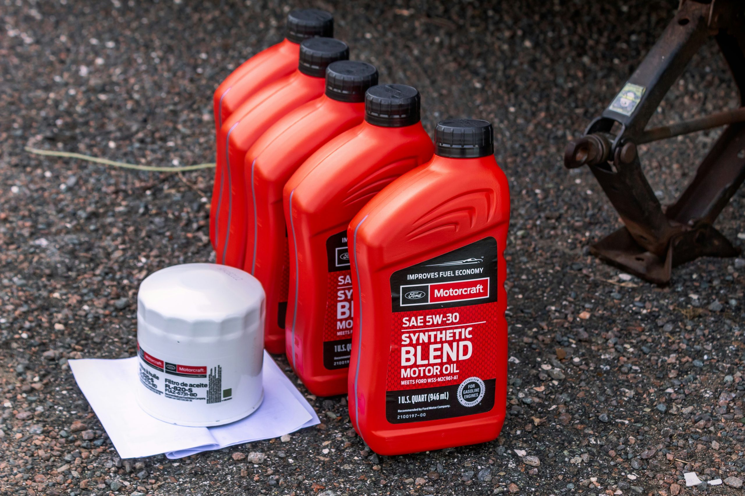 Several premium brake fluids are kept on the floor