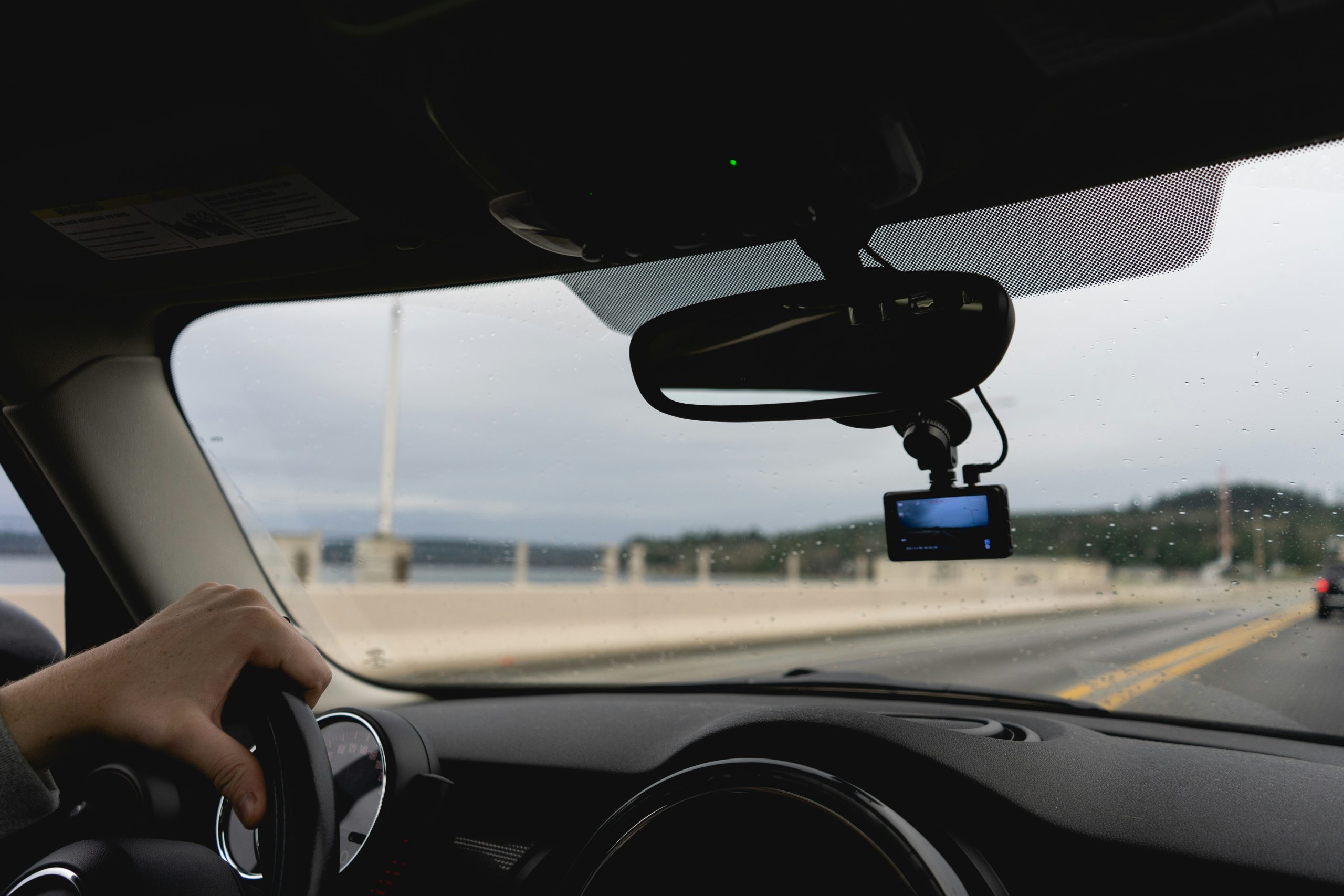 A car's windscreen is shown from the inside