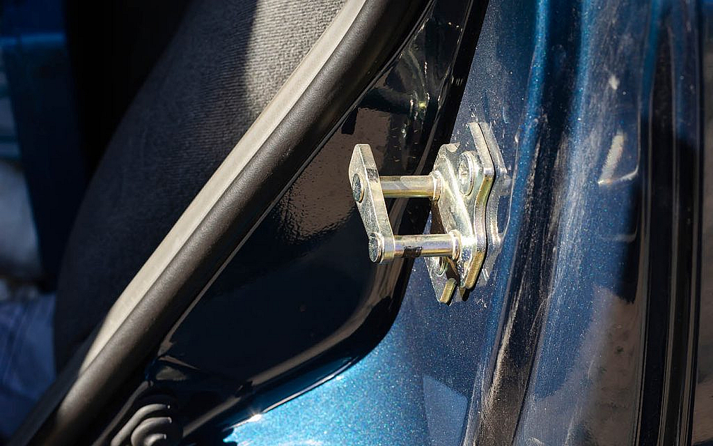 Dry the Latch After Washing the Vehicle