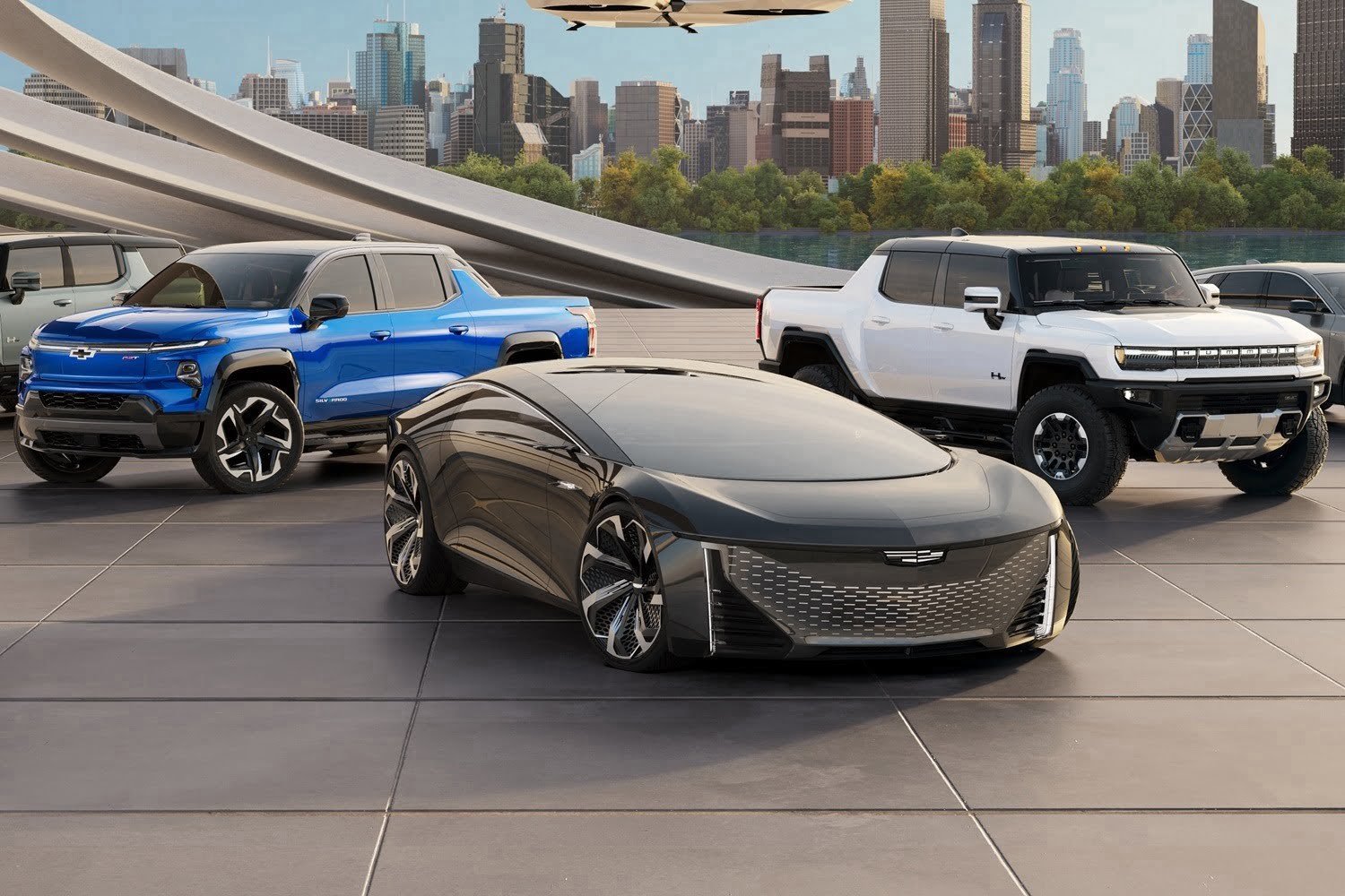 General Motors electric vehicle lineup featuring a Cadillac concept car, Chevrolet Silverado EV, and GMC Hummer EV