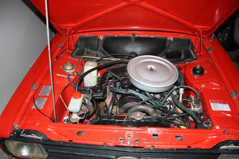 Simple 1980s car engine bay