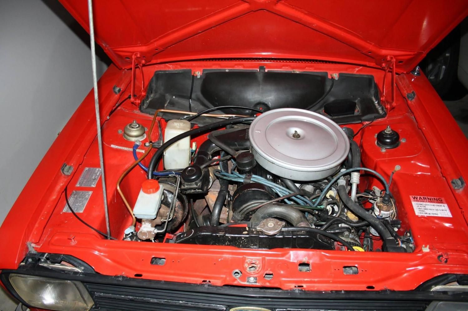 Simple 1980s car engine bay